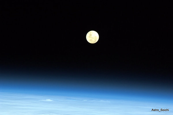 Full Moon high up in the sky.